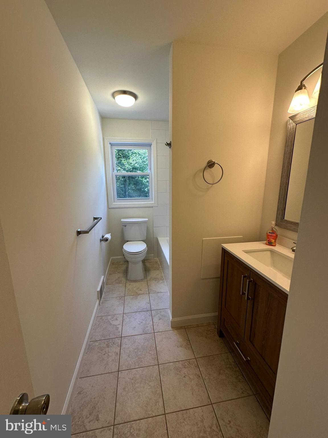 291 Union Street Glassboro, NJ 08028 - Photo 20 of 60 a bathroom with a sink and a toilet