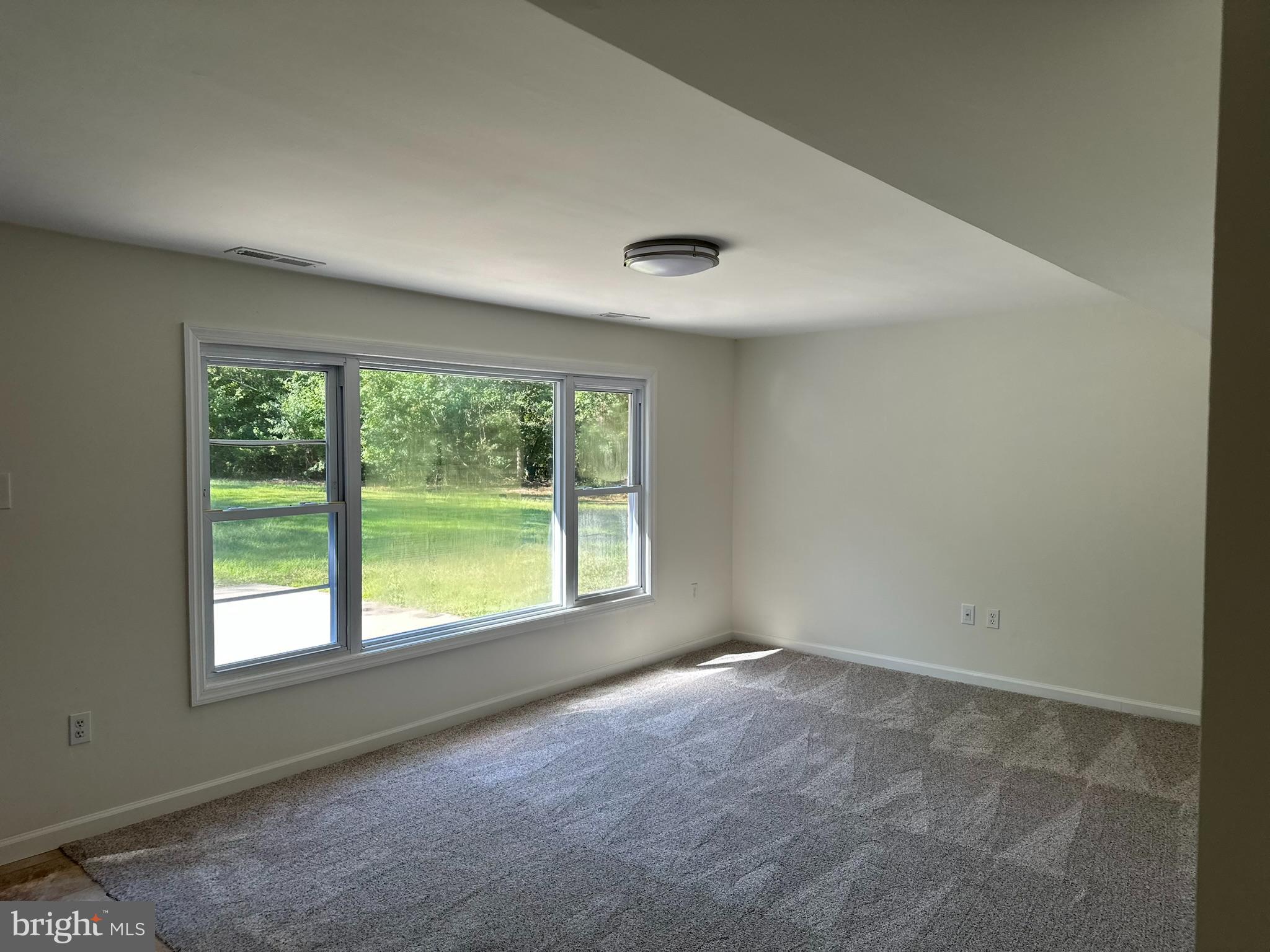 291 Union Street Glassboro, NJ 08028 - Photo 25 of 60 a view of an empty room with a window