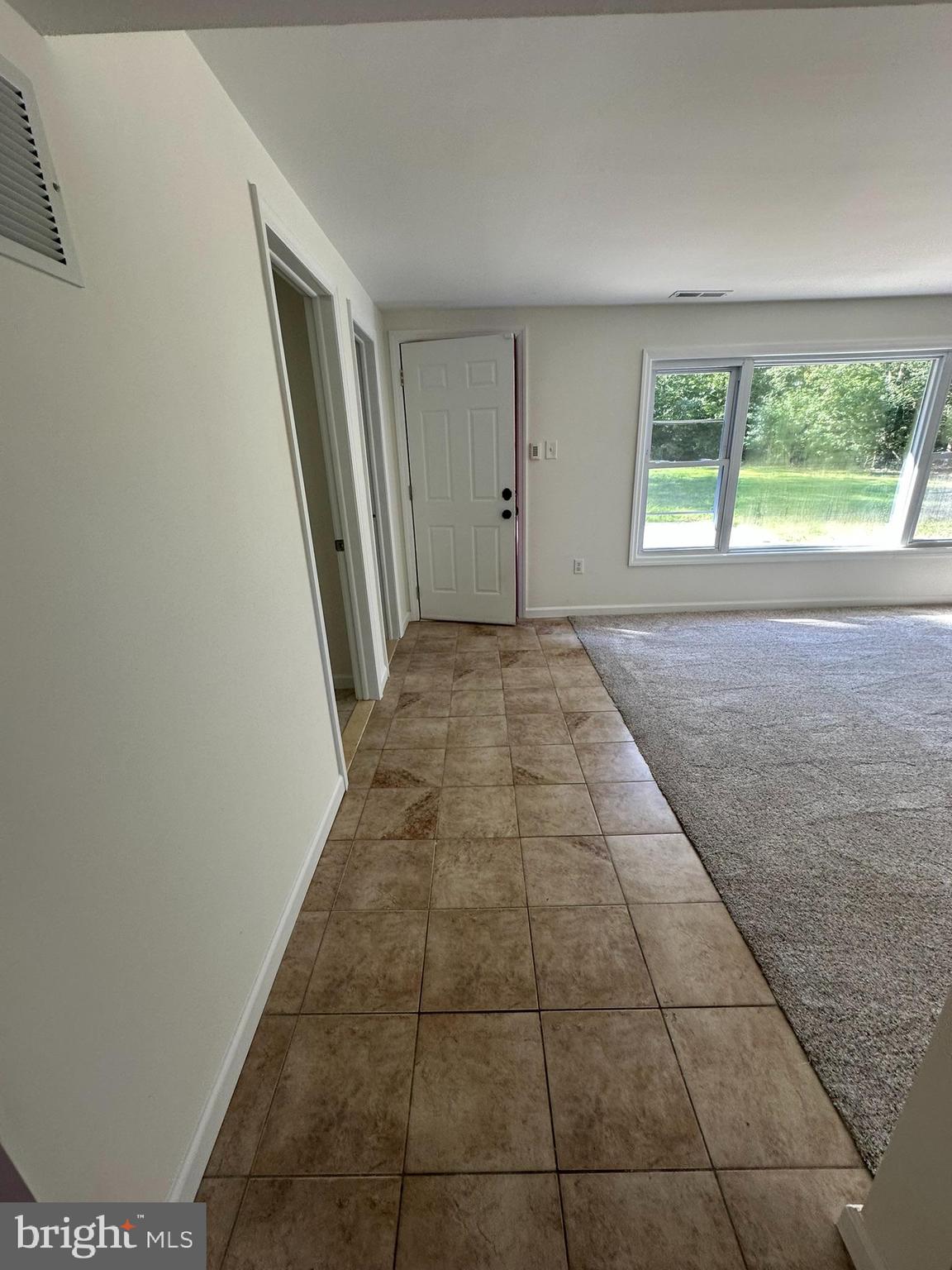 291 Union Street Glassboro, NJ 08028 - Photo 26 of 60 a view of hallway with window and a fireplace