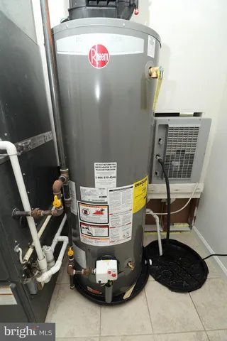 a bathroom with a toilet a sink and bathtub