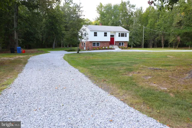 a view of a back yard of the house