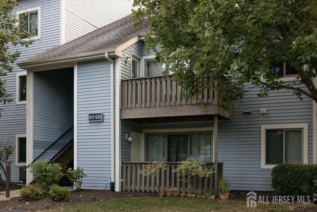 a view of a house with brick walls