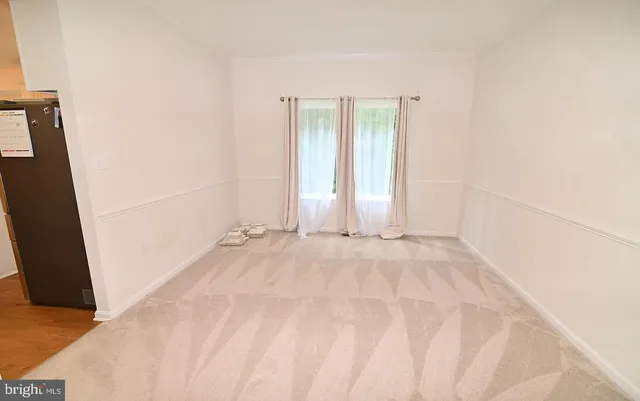 an empty room with a natural light