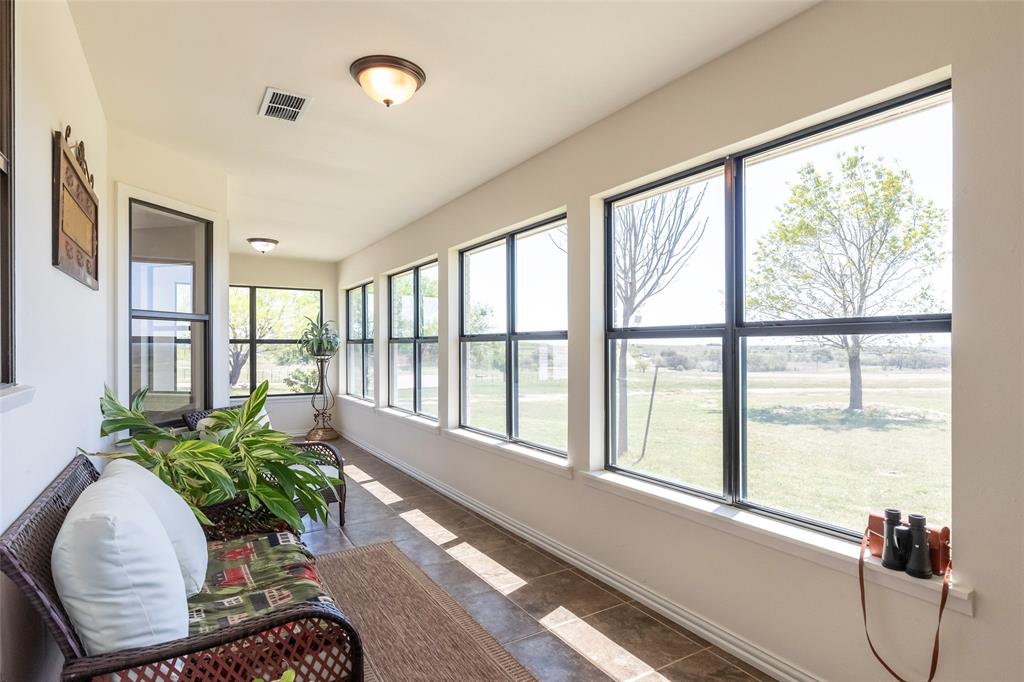 642 Fm 3200 Comanche, TX 76442 - Photo 10 of 37 a living room filled with furniture and a large window