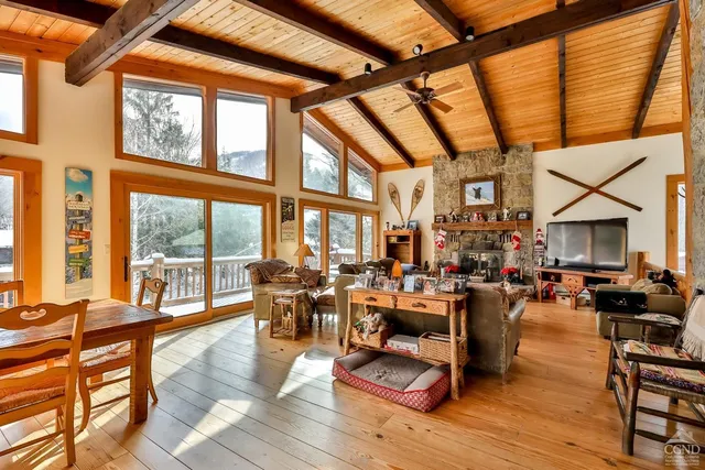 a kitchen with stainless steel appliances granite countertop a stove and a wooden cabinets