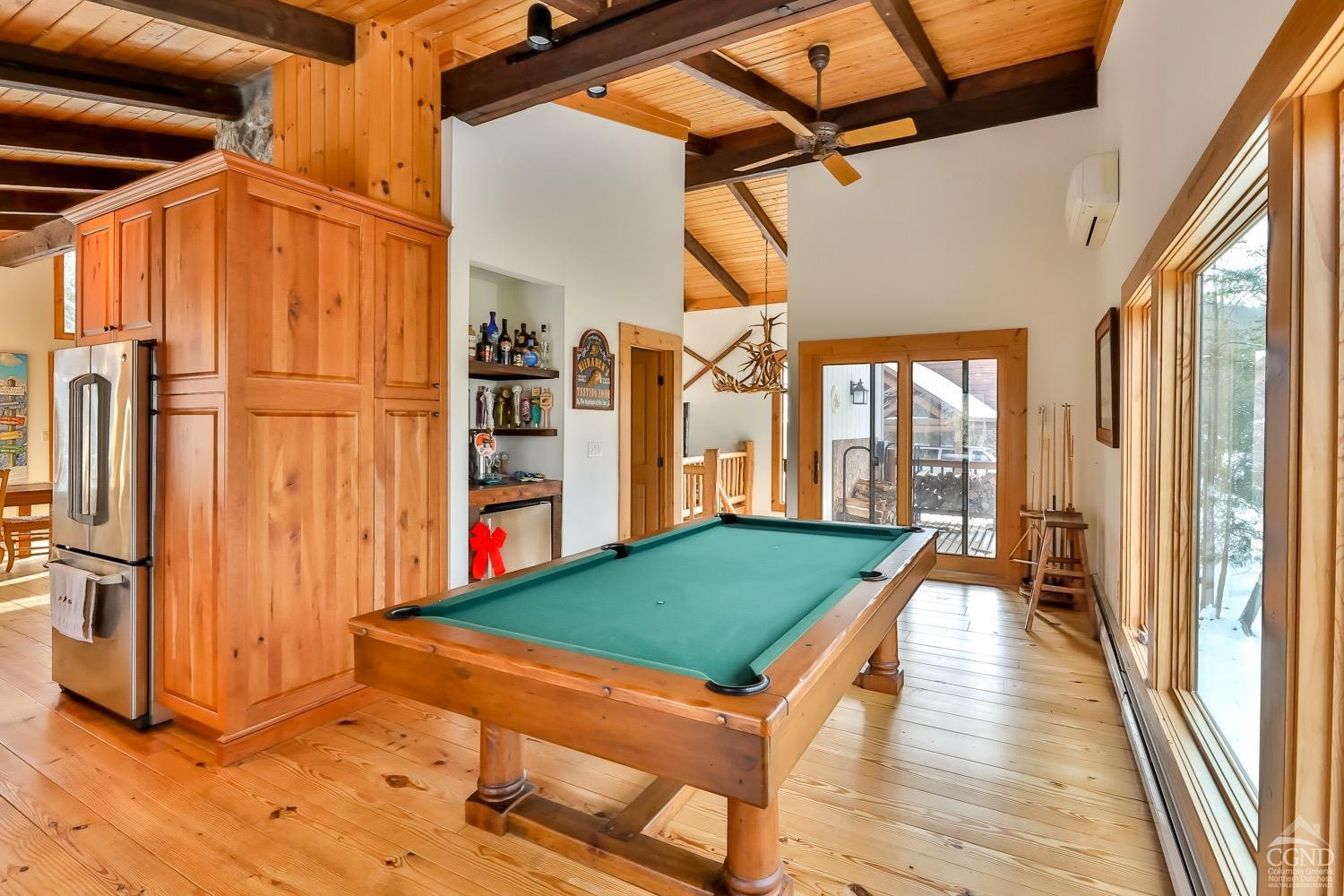 90 Club Road Windham, NY 12496 - Photo 39 of 77 a view of a room with wooden floor and furniture
