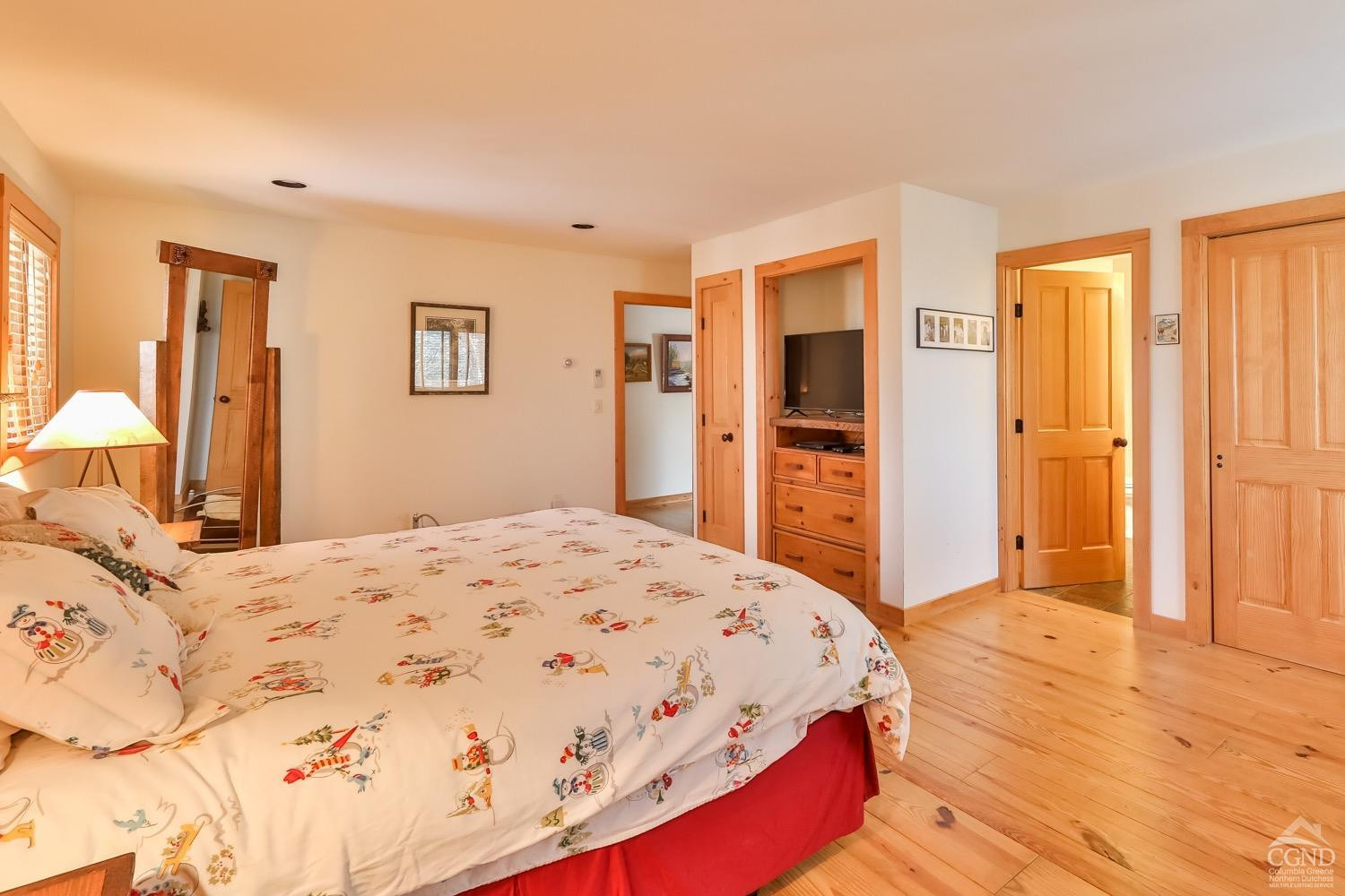 90 Club Road Windham, NY 12496 - Photo 44 of 77 a bedroom with a bed and a dresser