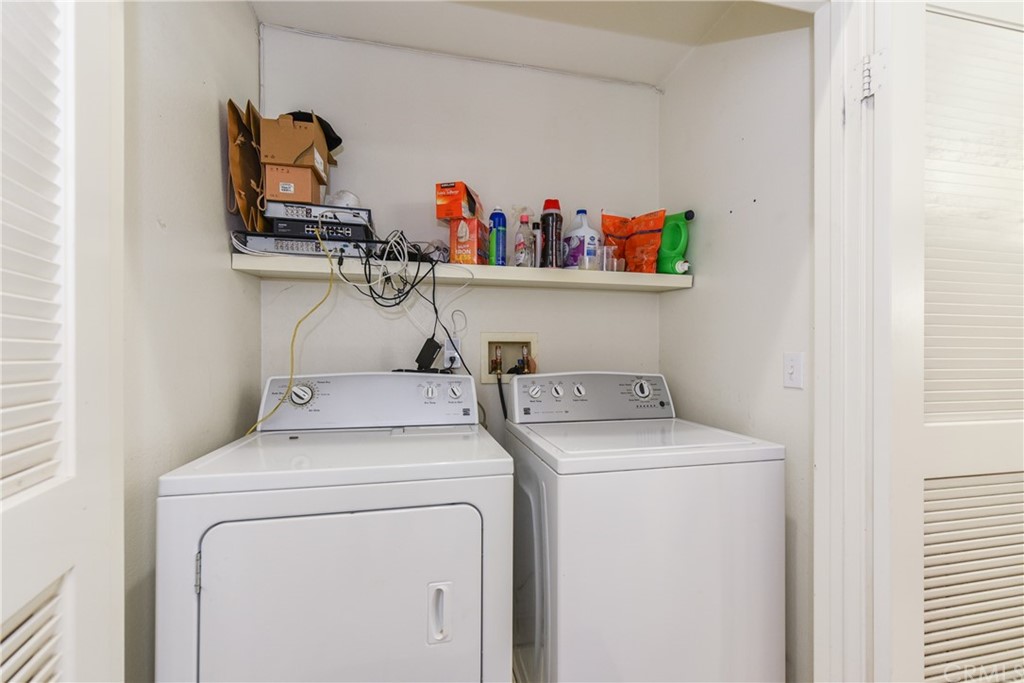 7637 Pinot Place Rancho Cucamonga, CA 91739 - Photo 16 of 39 a utility room with dryer and washer