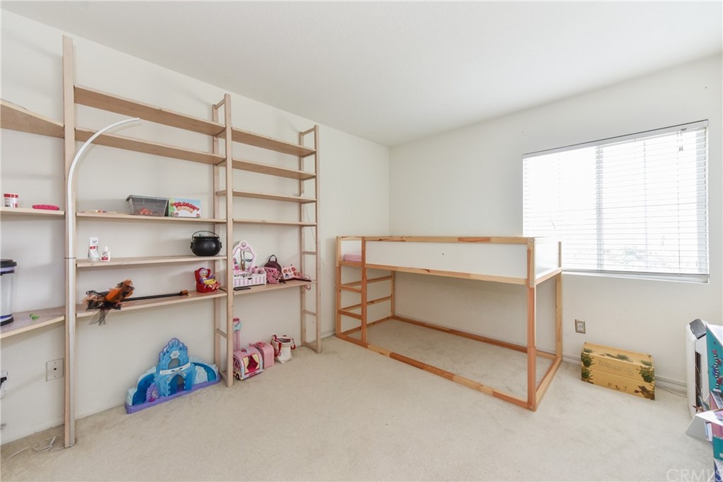 7637 Pinot Place Rancho Cucamonga, CA 91739 - Photo 27 of 39 a storage room with shelves