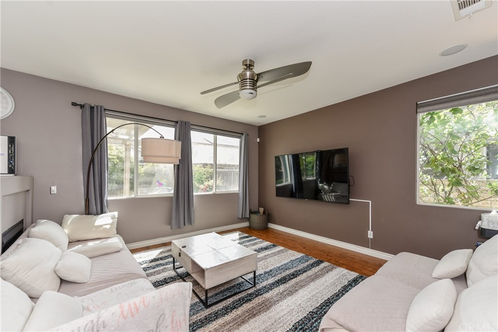 7637 Pinot Place Rancho Cucamonga, CA 91739 - Photo 7 of 39 a living room with furniture and a window