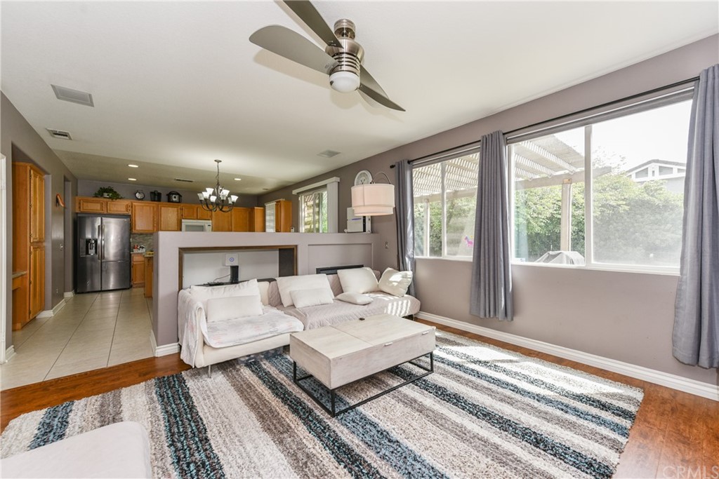 7637 Pinot Place Rancho Cucamonga, CA 91739 - Photo 9 of 39 a living room with furniture and a window