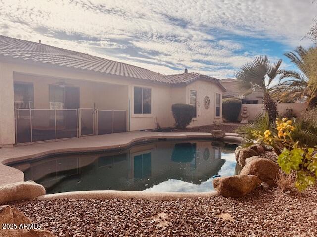 3374 East Phelps Street Gilbert, AZ 85295 - Photo 2 of 3 a view of a chairs and table in the patio