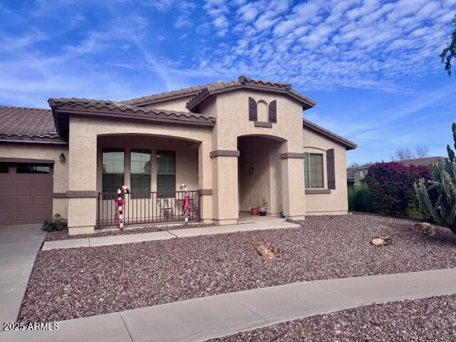 3374 East Phelps Street Gilbert, AZ 85295 - Photo 3 of 3 a front view of a house with garden