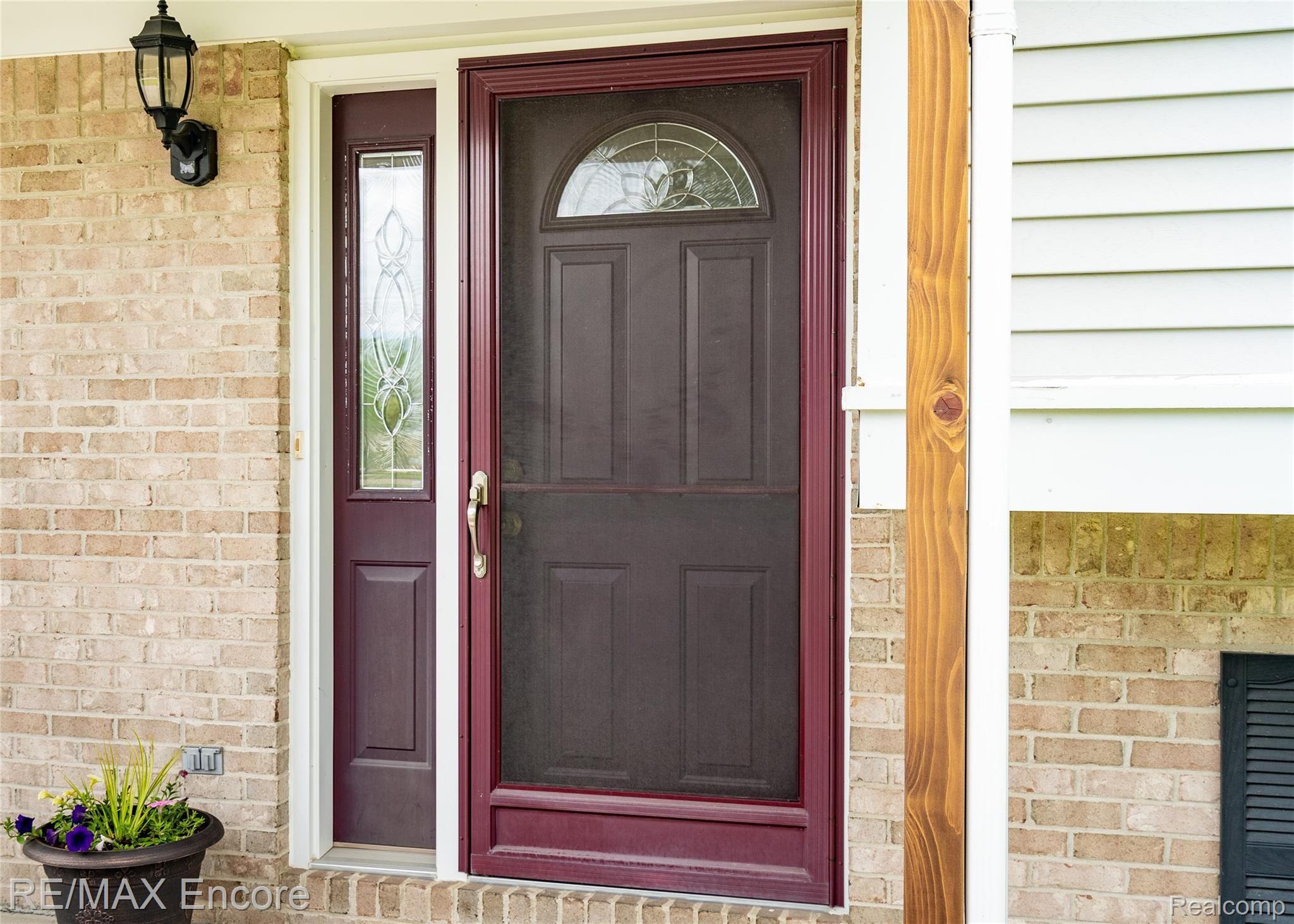 128 South Baldwin Road Oxford, MI 48371 - Photo 5 of 42 QUALITY DOORS & WINDOWS THROUGHOUT