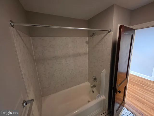 a bathroom with a bathtub