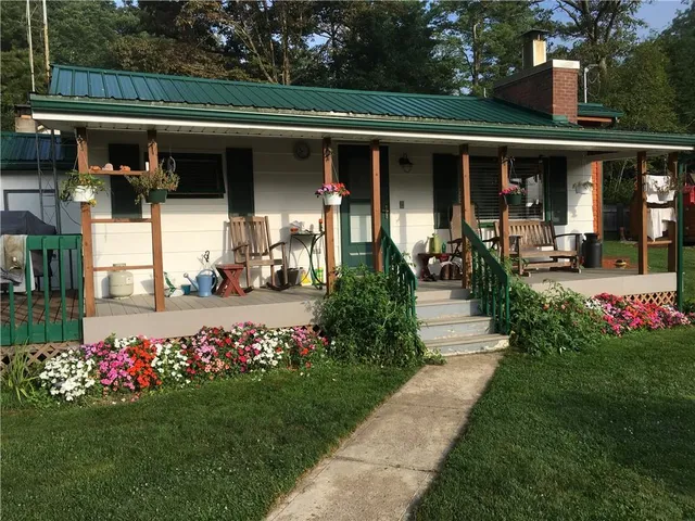 a front view of a house having yard