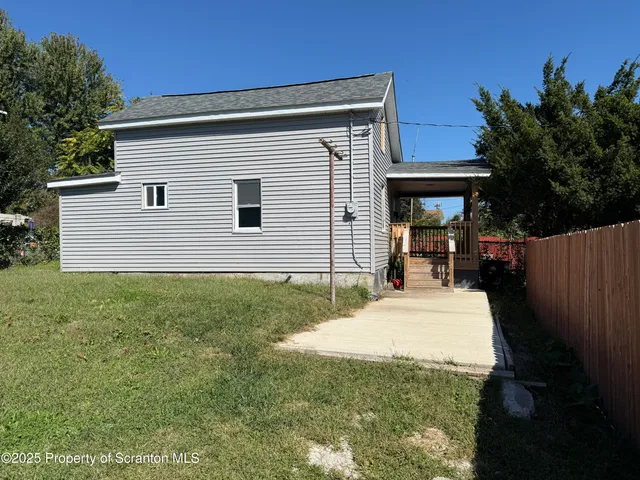 a view of a backyard with a garden
