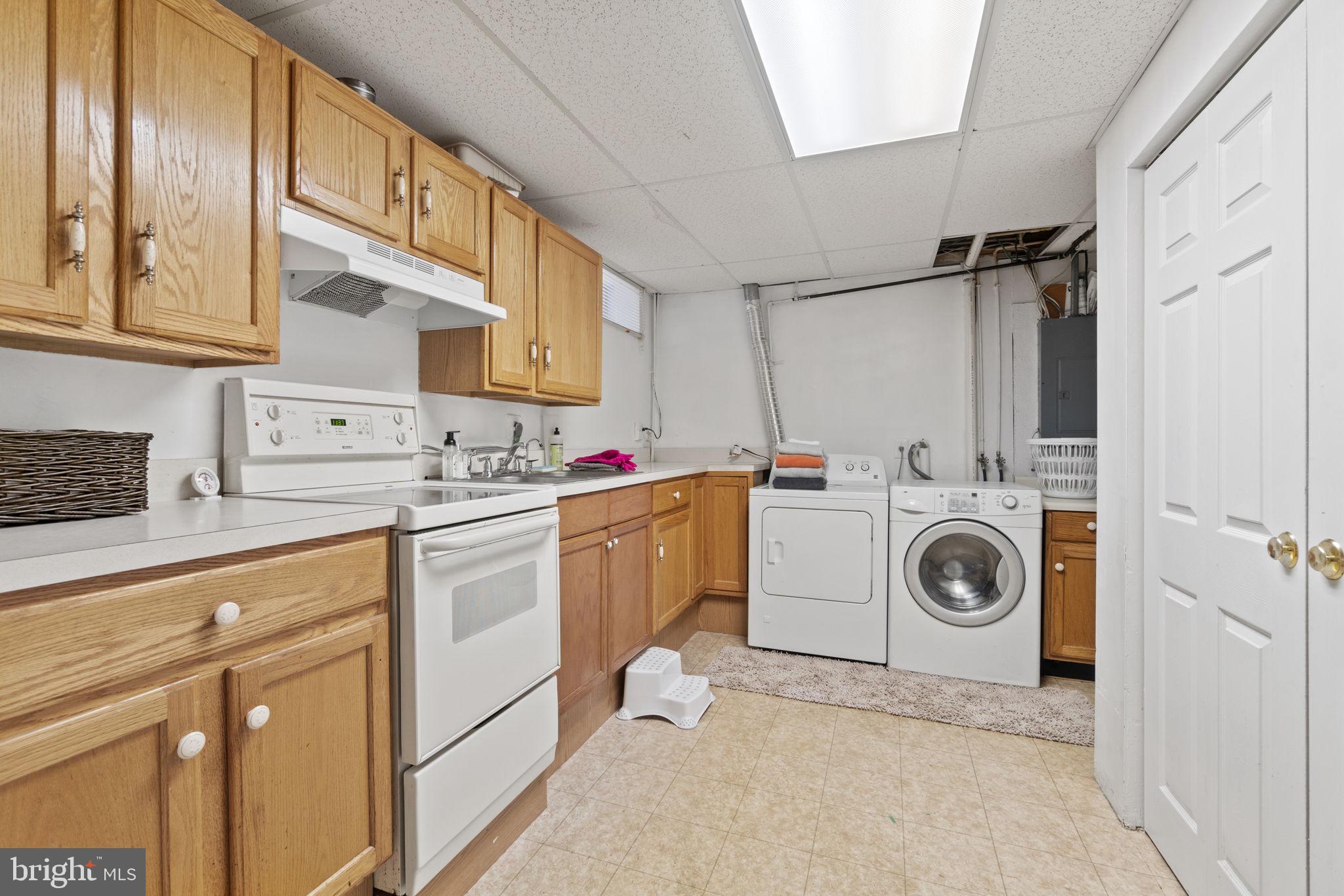 7820 Shallowbrook Court Severn, MD 21144 - Photo 26 of 35 Bonus basement kitchenette and laundry area