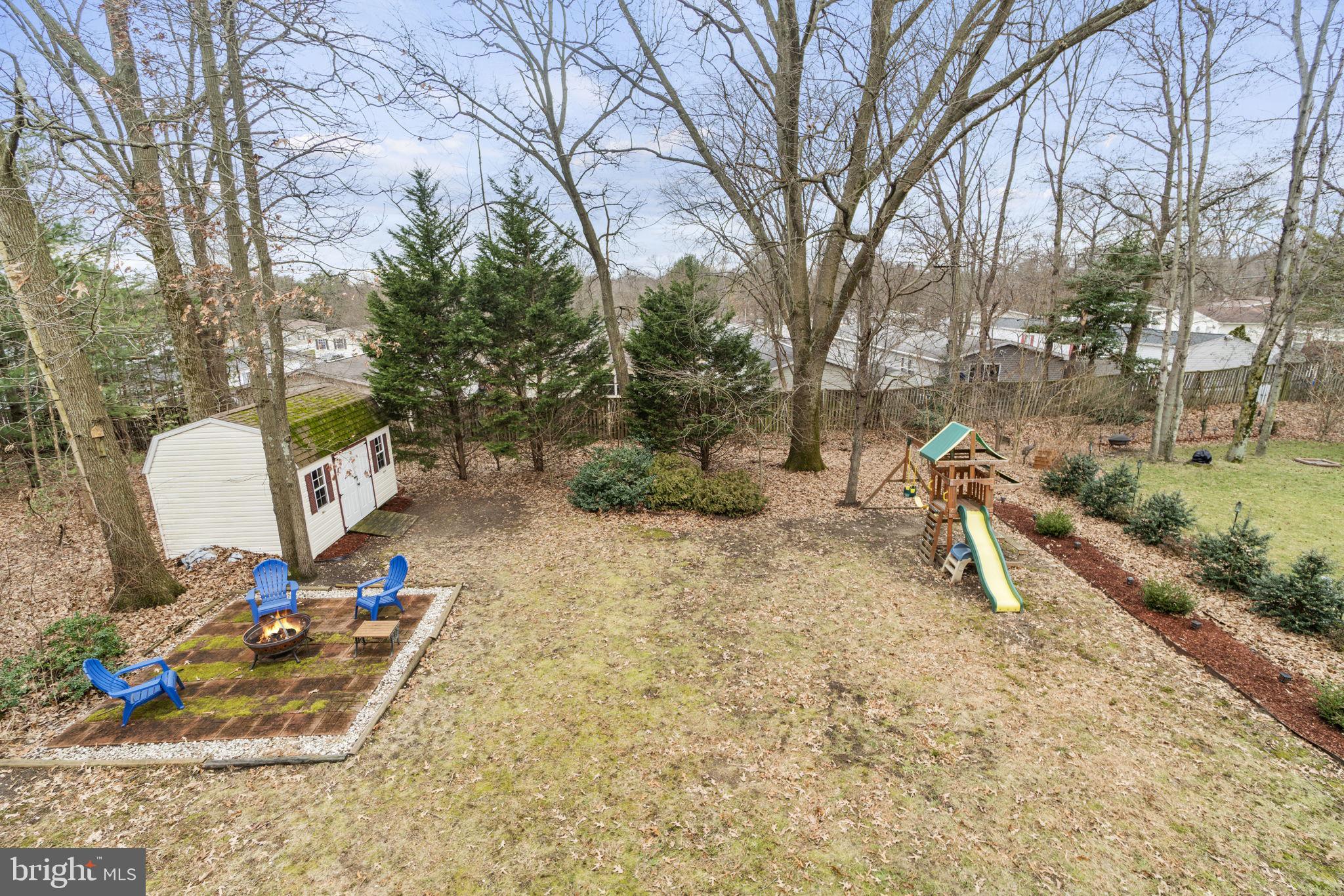 7820 Shallowbrook Court Severn, MD 21144 - Photo 31 of 35 Firepit, playground, shed, flat, cleared!