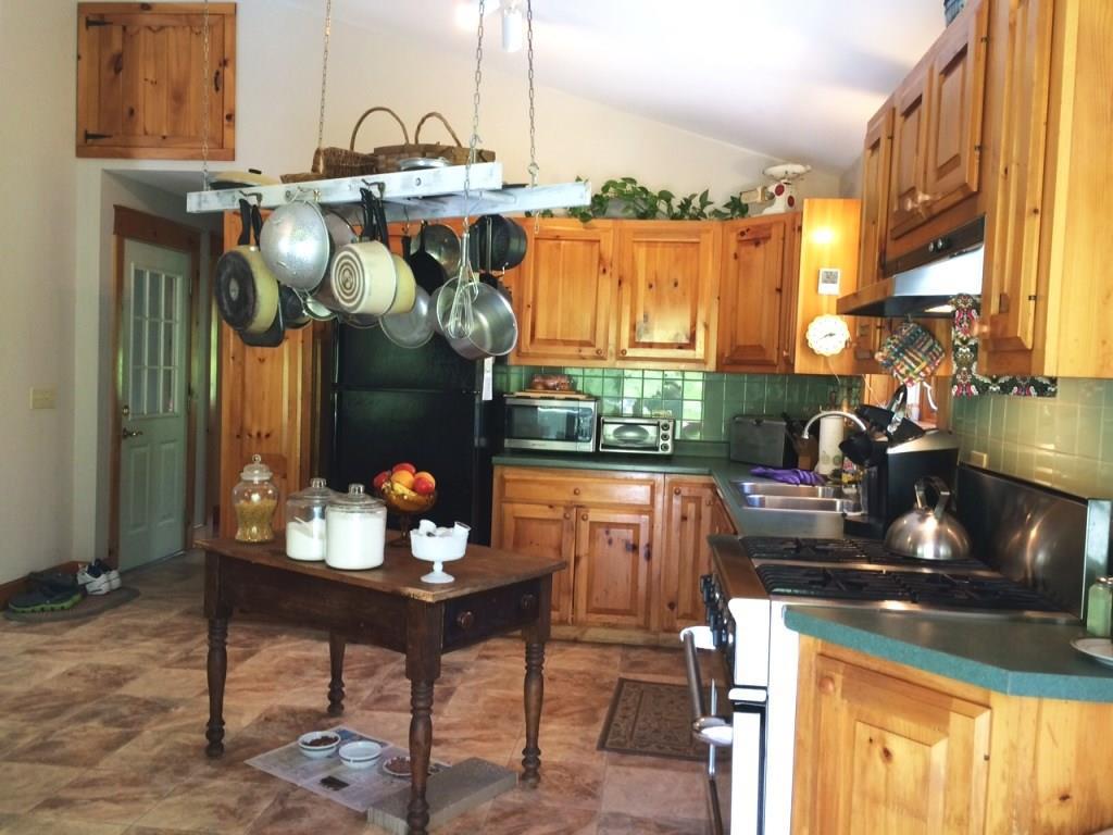 66 Litchfield Road Freeport, ME 04032 - Photo 2 of 15 Cathedral ceilings in both the...