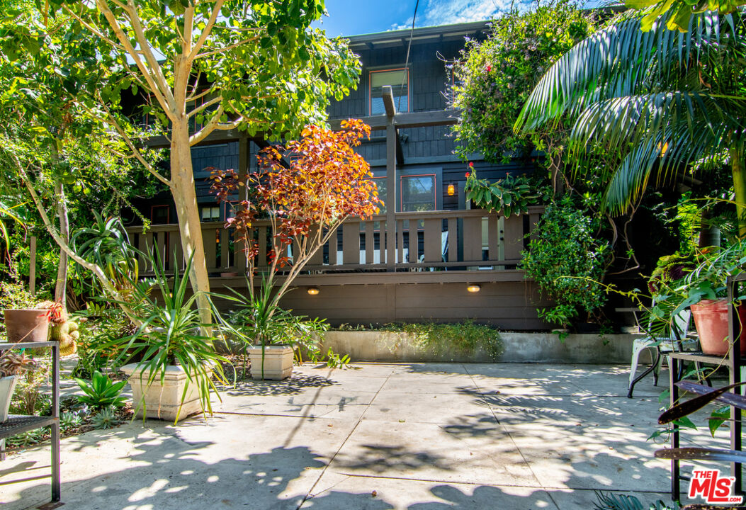 a view of a bench in a backyard