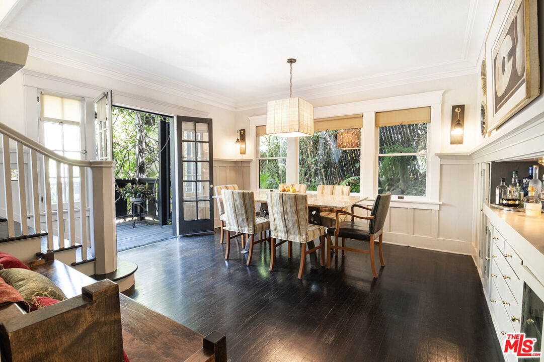 1918 Pinehurst Road Los Angeles, CA 90068 - Photo 12 of 66 a view of a dining room with furniture window and wooden floor