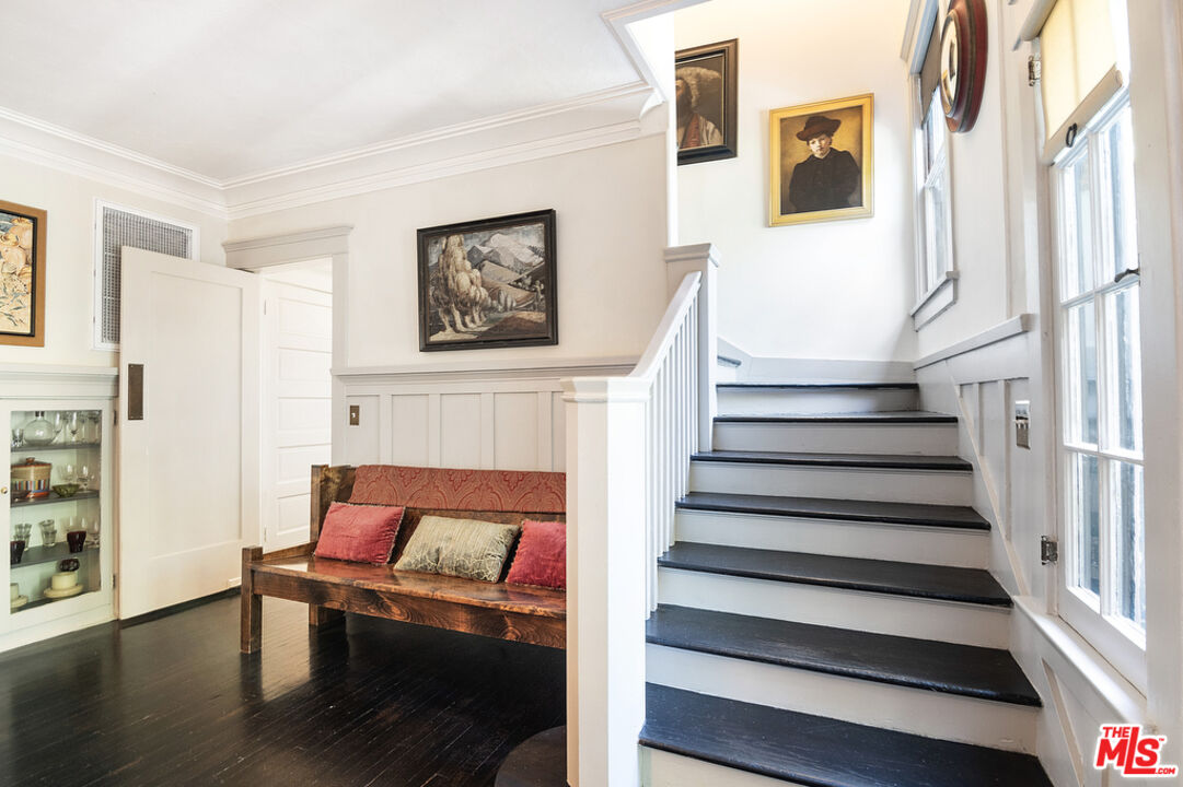 1918 Pinehurst Road Los Angeles, CA 90068 - Photo 13 of 66 a view of entryway with stairs and wooden floor