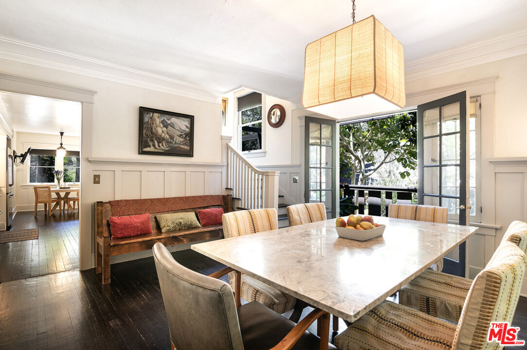 1918 Pinehurst Road Los Angeles, CA 90068 - Photo 15 of 66 a view of a dining room with furniture and a window