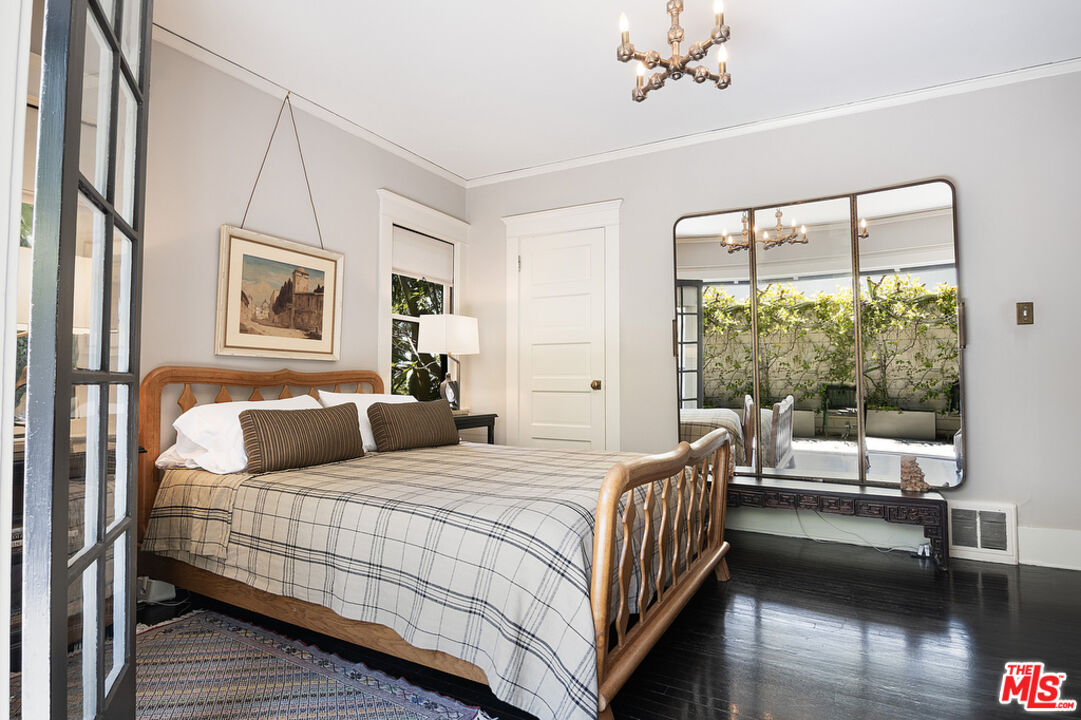 1918 Pinehurst Road Los Angeles, CA 90068 - Photo 29 of 66 a bedroom with a bed and a large window