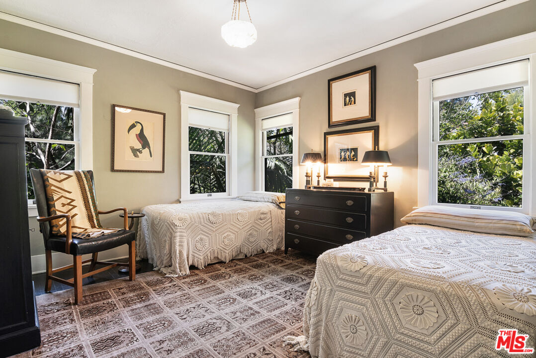 1918 Pinehurst Road Los Angeles, CA 90068 - Photo 33 of 66 a bed room with a bed and a chair