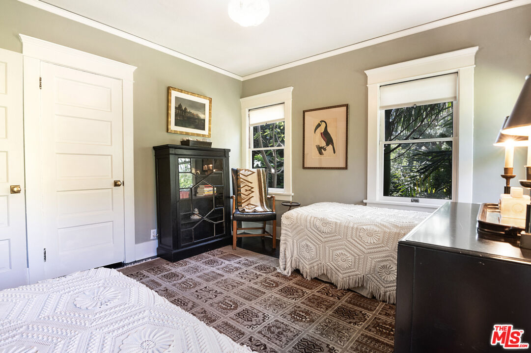 1918 Pinehurst Road Los Angeles, CA 90068 - Photo 34 of 66 a bedroom with a large bed and a window