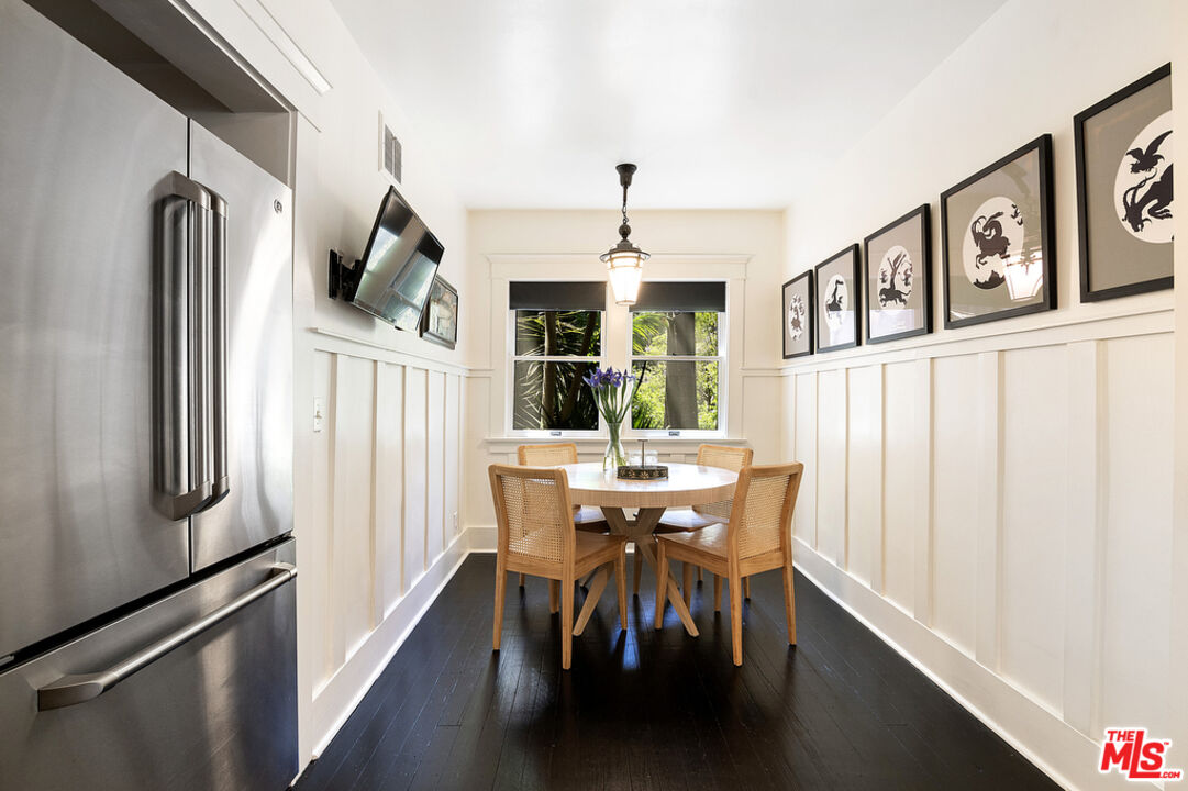 1918 Pinehurst Road Los Angeles, CA 90068 - Photo 36 of 66 a dining room with furniture window entryway and wooden floor