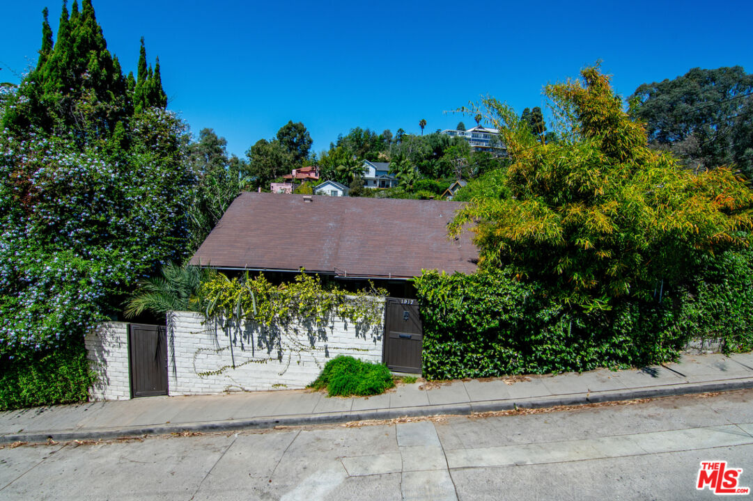 1918 Pinehurst Road Los Angeles, CA 90068 - Photo 62 of 66 front view of a house with a yard