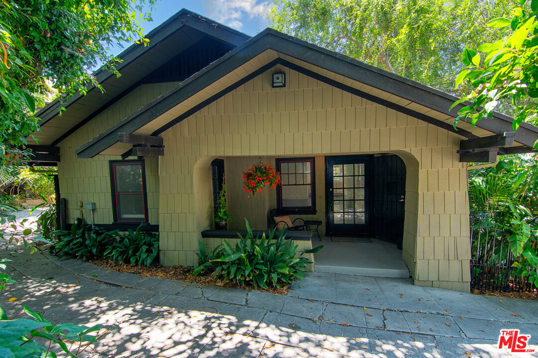 1918 Pinehurst Road Los Angeles, CA 90068 - Photo 63 of 66 a front view of a house with garden