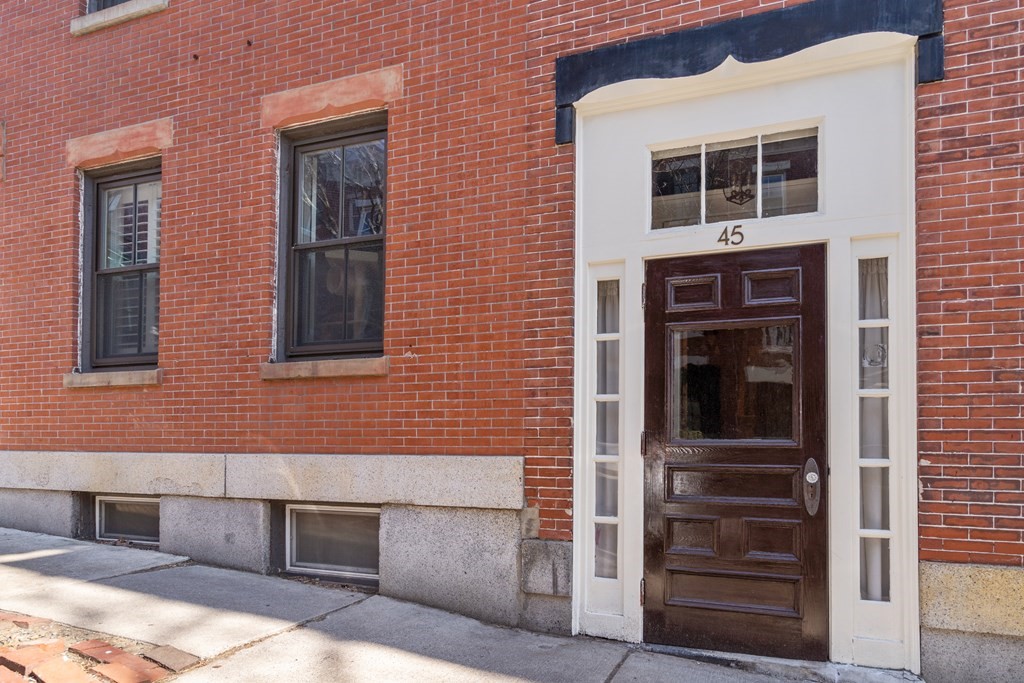 45 Baldwin Street, Unit 2 Boston, MA 02129 - Photo 12 of 12 a brick house with a large windows