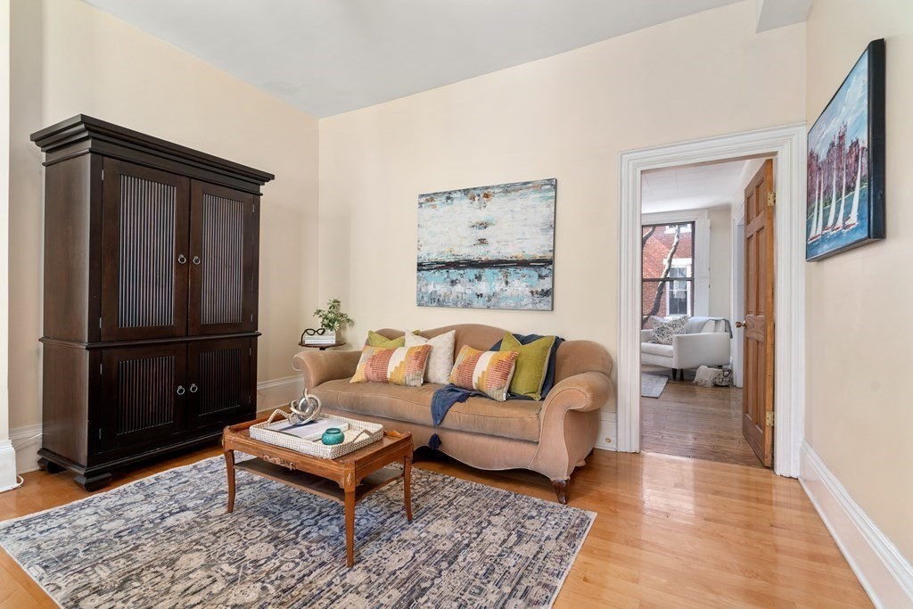 45 Baldwin Street, Unit 2 Boston, MA 02129 - Photo 2 of 12 a living room with furniture and a rug