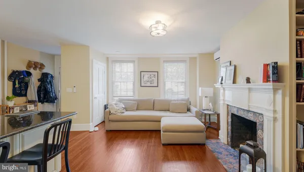 a bed room with a bed and a television