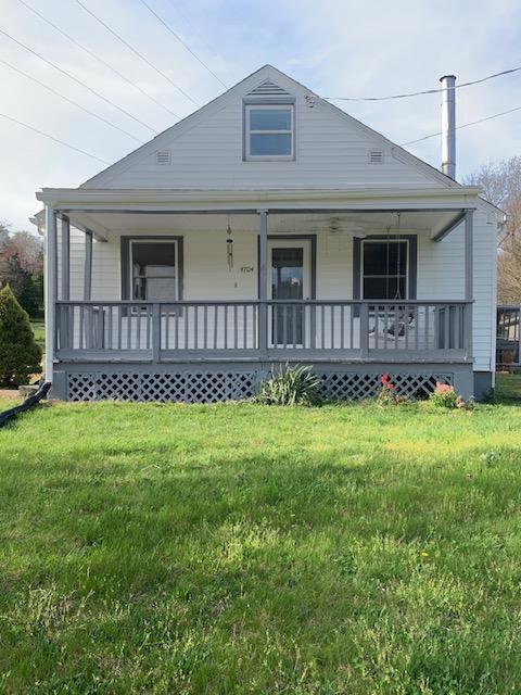 4704 Goodman Road Roanoke, VA 24014 - Photo 1 of 25 a front view of a house with garden