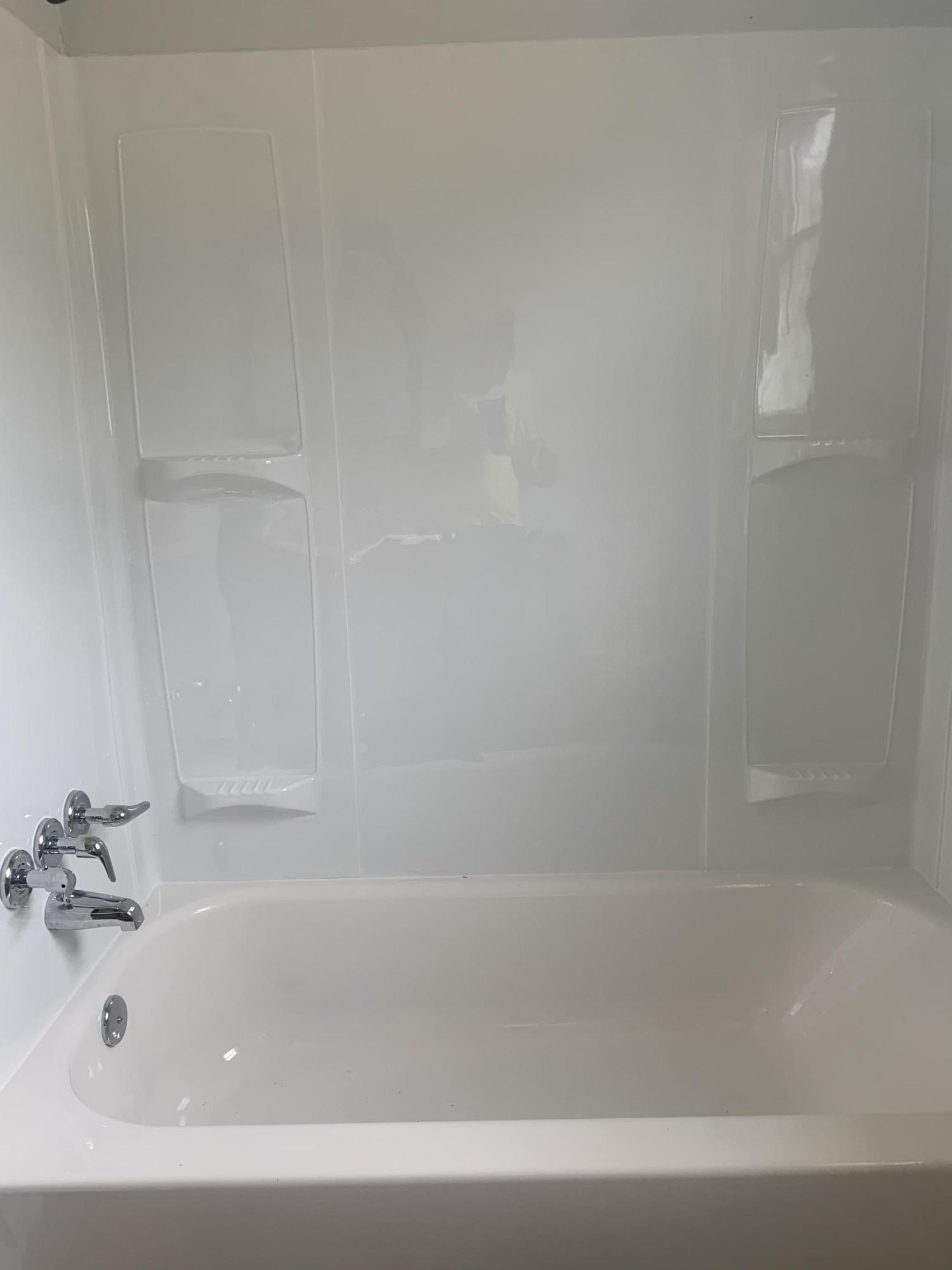 4704 Goodman Road Roanoke, VA 24014 - Photo 12 of 25 a bathroom with bathtub