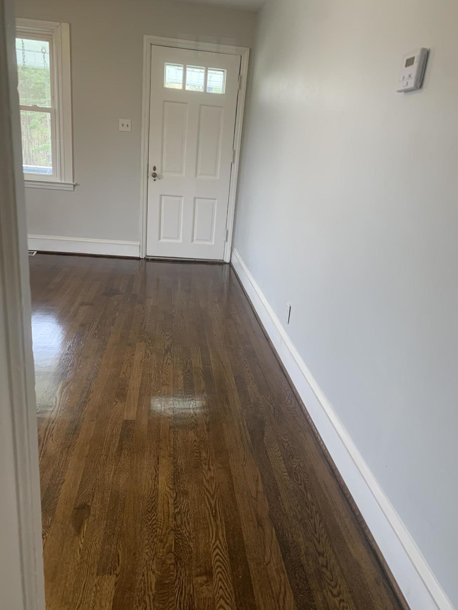 4704 Goodman Road Roanoke, VA 24014 - Photo 5 of 25 a view of hallway with wooden floor