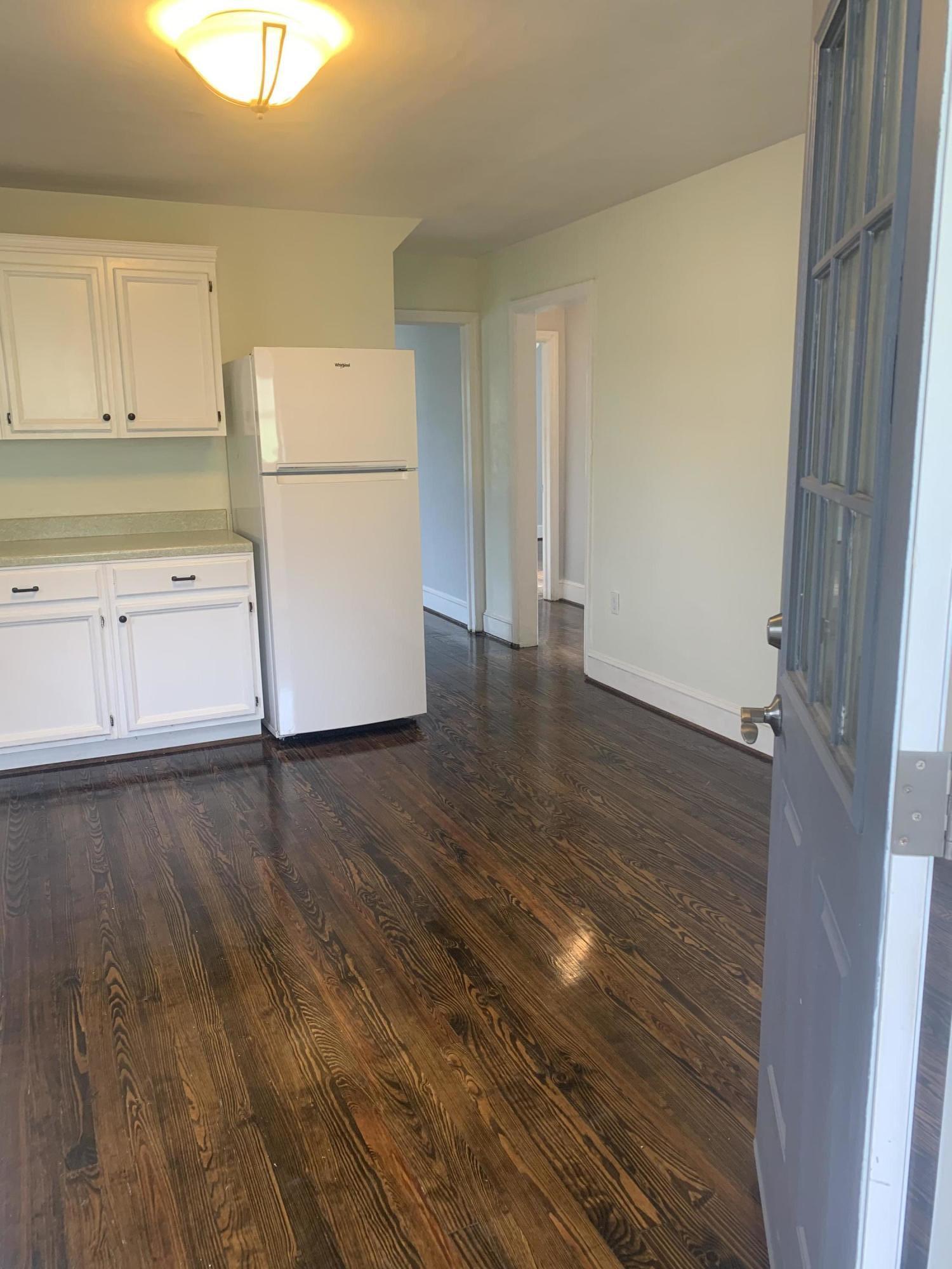 4704 Goodman Road Roanoke, VA 24014 - Photo 9 of 25 a view of a kitchen with wooden floor