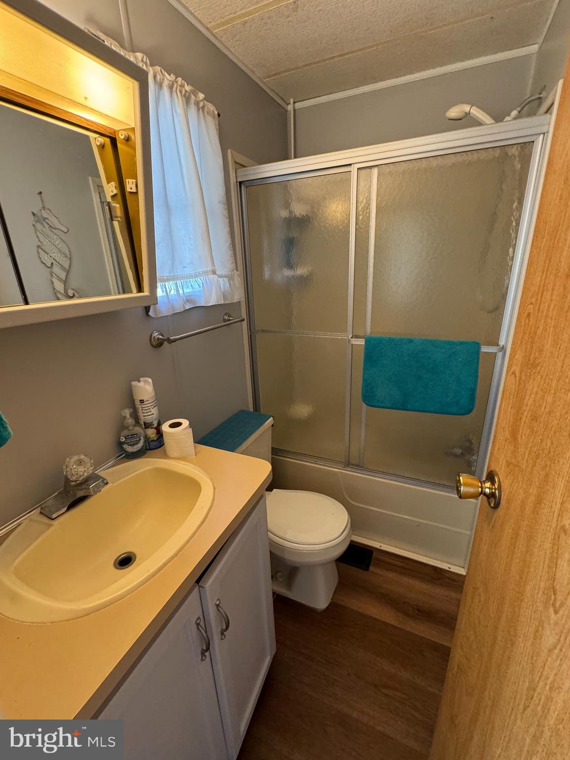 148 Ocean Oval Drive Berlin, MD 21811 - Photo 15 of 29 a bathroom with a sink toilet and shower