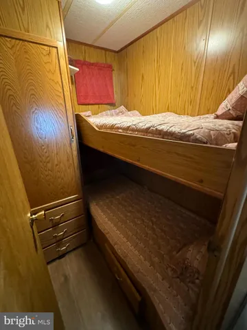 a kitchen with a stove a sink and a microwave