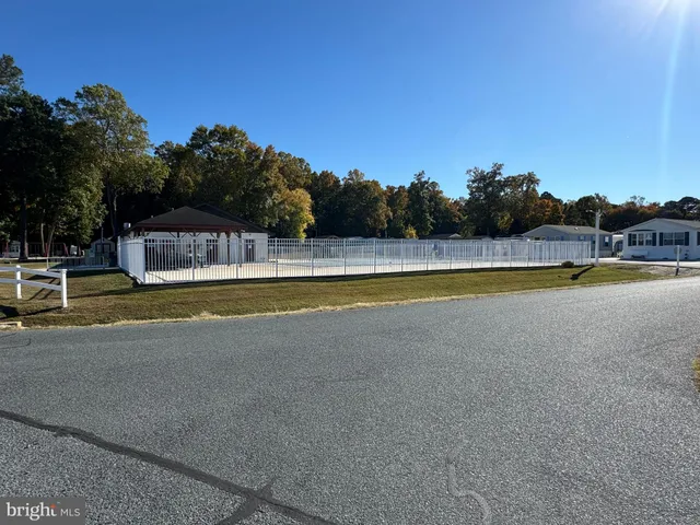 a view of swimming pool with outdoor seating