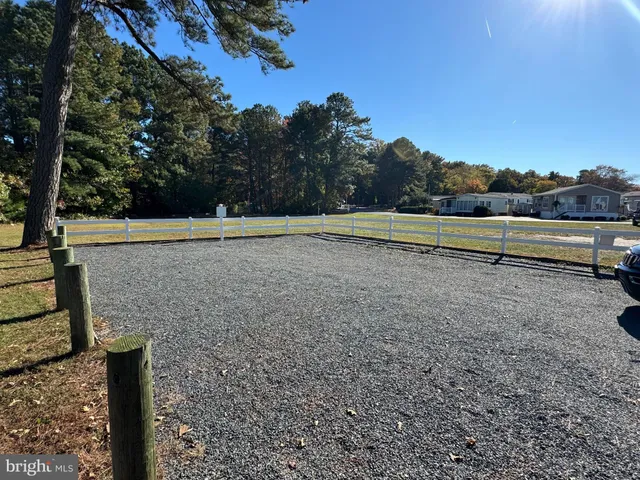 a view of a swimming pool with sitting area