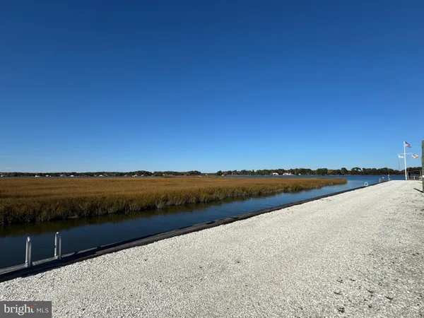 a view of outdoor space with swimming pool and furniture