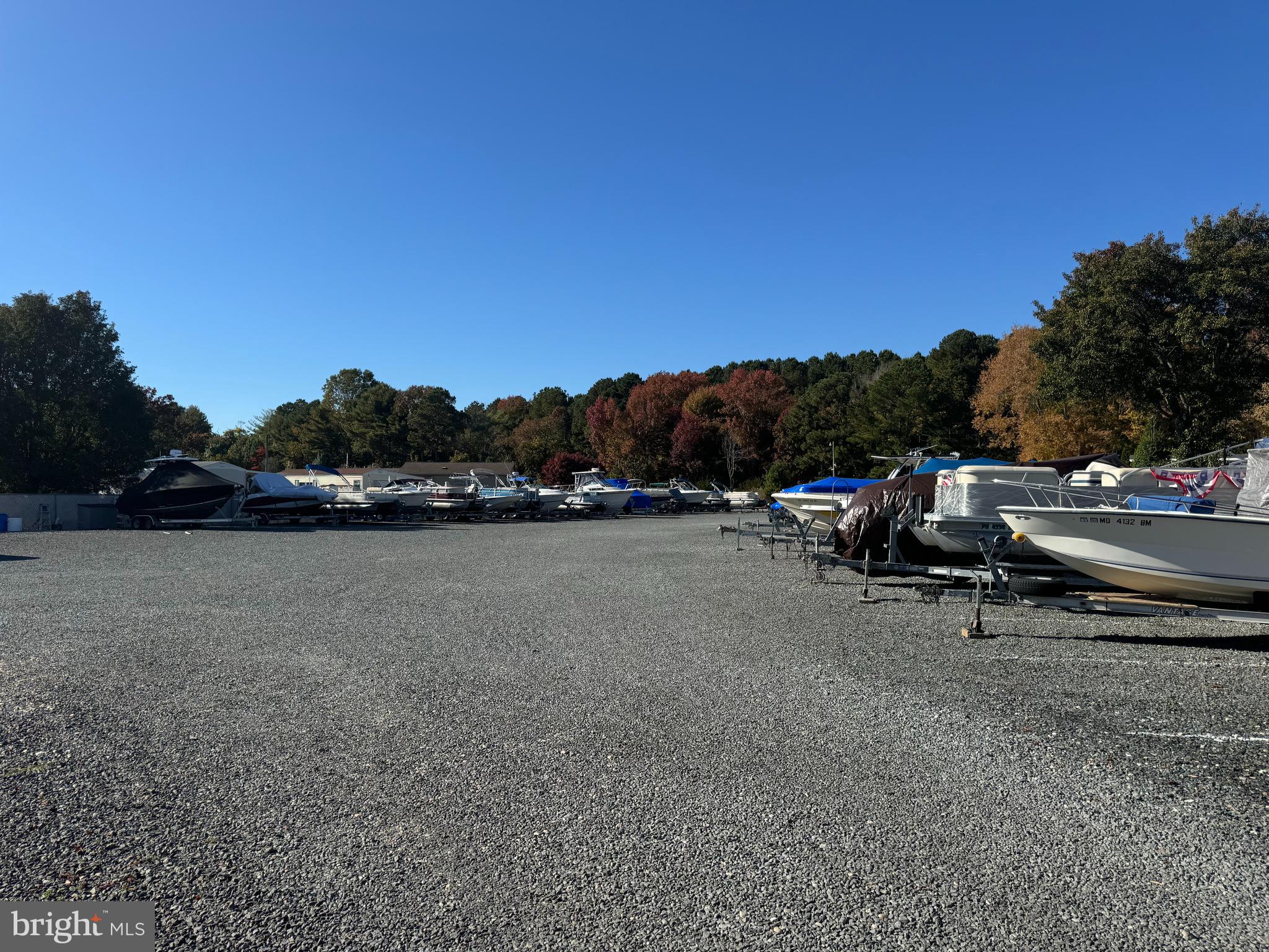 148 Ocean Oval Drive Berlin, MD 21811 - Photo 10 of 29 a view of outdoor space with swimming pool and furniture