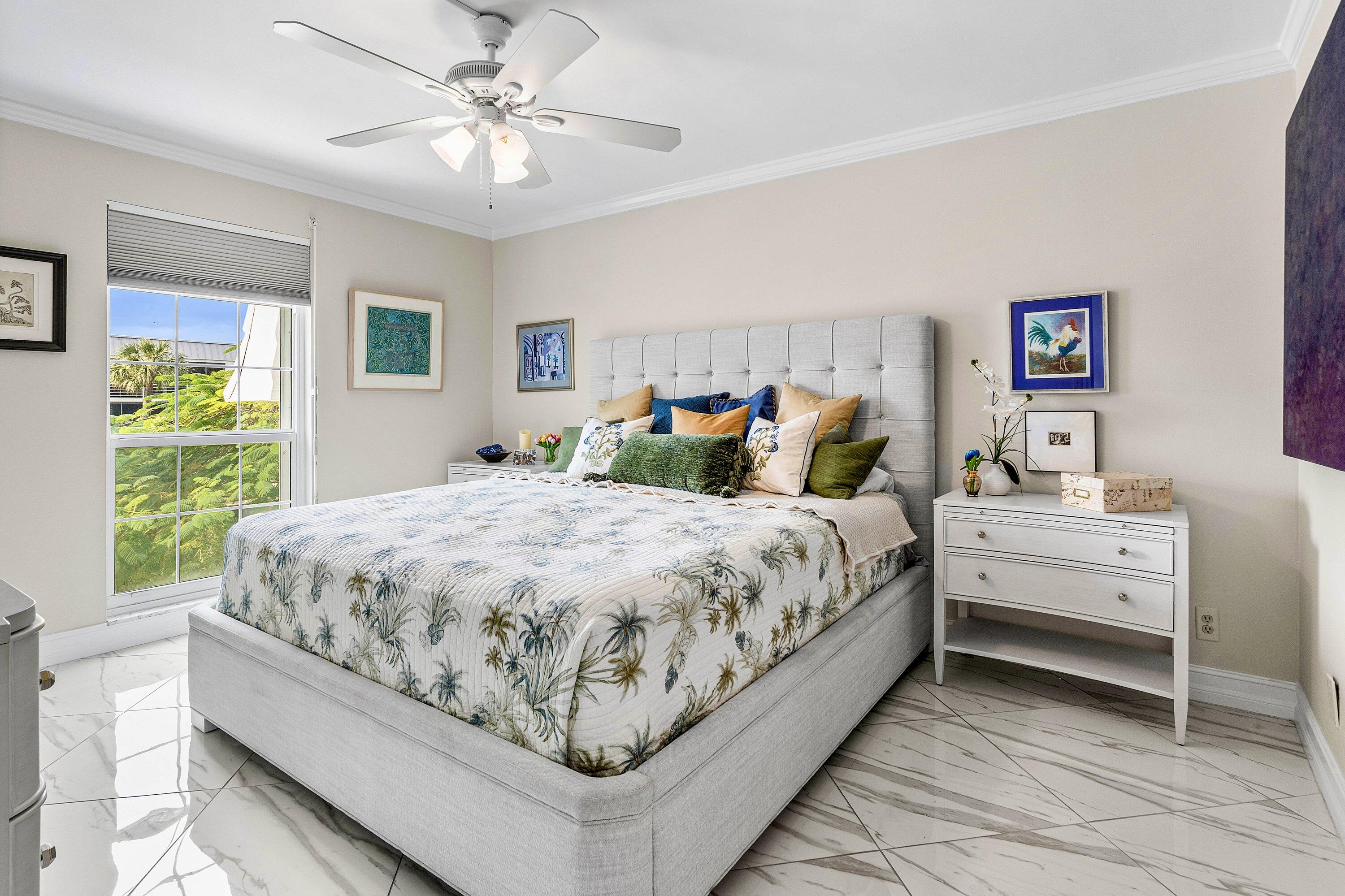 765 Jeffery Street, Unit 1203 Boca Raton, FL 33487 - Photo 16 of 31 a bed sitting in a bedroom and window