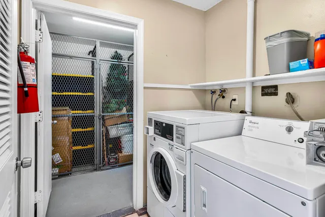 a utility room with dryer and washer