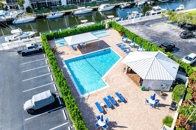 an aerial view of a house with outdoor space